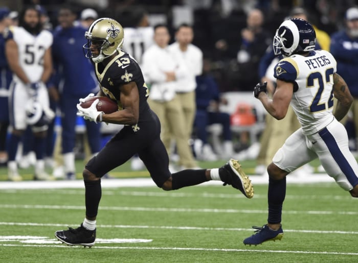 New Orleans Saints wideout Michael Thomas (13) scores past Los Angeles Rams cornerback Marcus Peters (22). Mandatory Credit: John David Mercer-USA TODAY